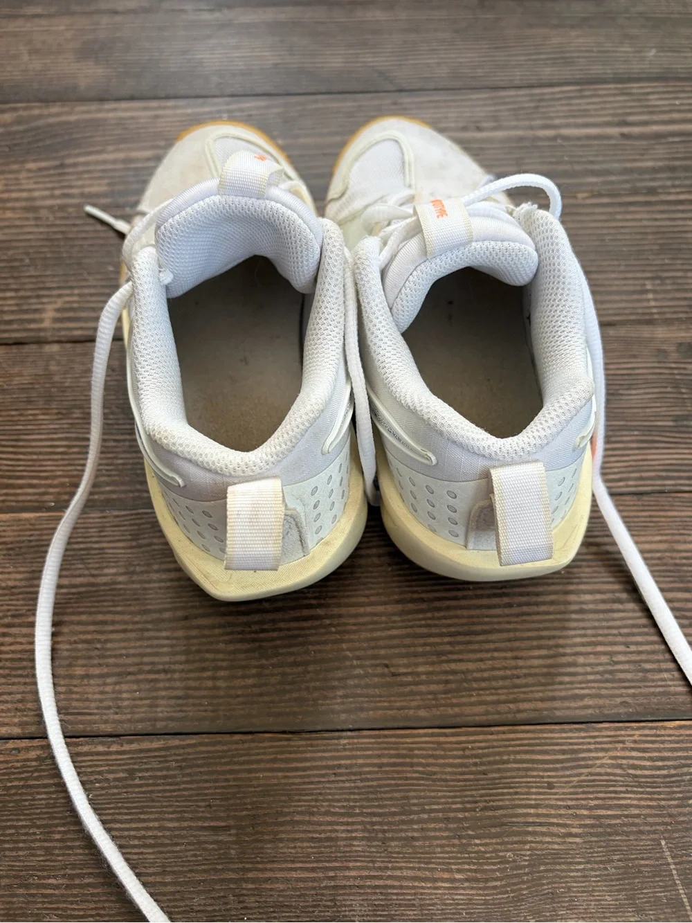 Nike White Basketball Sneakers with Orange Accents and Gum Sole